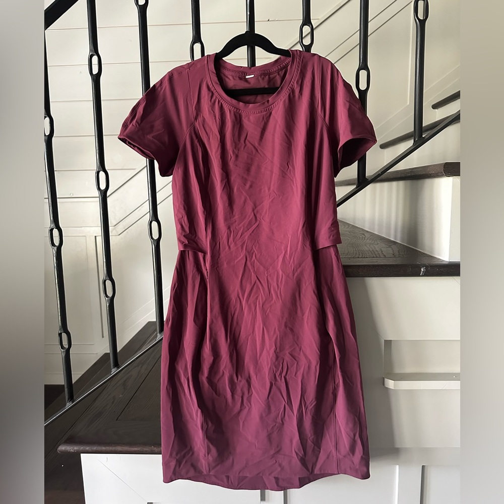 Worn once Lululemon dress with pockets and hidden mesh back size 4 Maroon